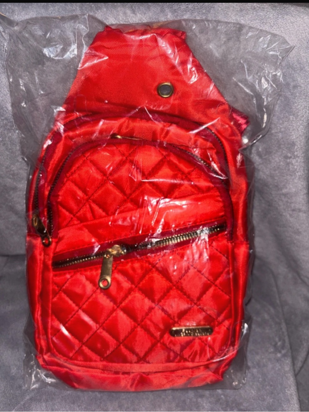 NWT Quilted Sling Backpack in red